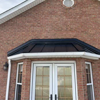 Crawley Roofing - Metal Standing Seam Bay Window - Roofing Near Me - Brookville, Indiana Crawley Roofing - Metal Standing Seam Bay Window - Roofing Near Me - Brookville, Indiana