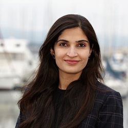 Marina Landing Family Dentistry - Dr. Dharia in front of the office.