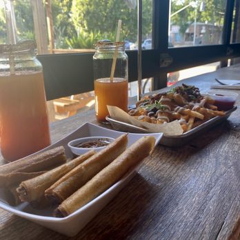Midtown Spirits - Lumpia & baked potato fries - Bars Near Me - Sacramento, California Midtown Spirits - Lumpia & baked potato fries - Bars Near Me - Sacramento, California