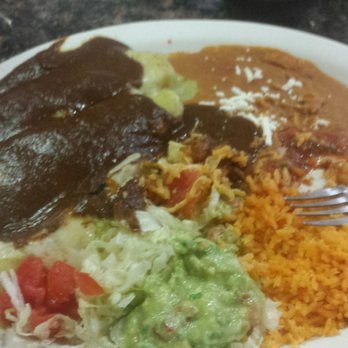 Serranos Mexican Grill - Chicken enchiladas with Mole and Verde sauce. I love the smoky/bitter from the Mole sauce accompanied with the spicy/fresh from the Verde - Mexican Near Me - Valparaiso, Indiana Serranos Mexican Grill - Chicken enchiladas with Mole and Verde sauce. I love the smoky/bitter from the Mole sauce accompanied with the spicy/fresh from the Verde - Mexican Near Me - Valparaiso, Indiana