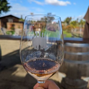 Bastian's Vineyards - a hand holding a wine glass - Wineries Near Me - Escondido, California Bastian's Vineyards - a hand holding a wine glass - Wineries Near Me - Escondido, California