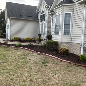Richmond Landscaping Team - a front yard with a flower bed - Landscaping Near Me Richmond Landscaping Team - a front yard with a flower bed - Landscaping Near Me