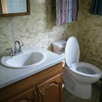 Countryside Cottages - Bathroom, shower is across from toilet. The shower is a bit small. - Hotels Near Me - Bartonsville, Pennsylvania Countryside Cottages - Bathroom, shower is across from toilet. The shower is a bit small. - Hotels Near Me - Bartonsville, Pennsylvania