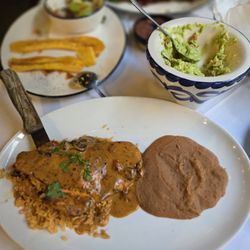 Pollo Jalisco! With rice and refried beans.