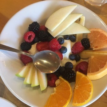 Cafe Sintra - Fruit and yogurt bowl with apples, pears, blackberries, raspberries, strawberries, blueberries, oranges, and grapefruit. - New American Near Me - Sunriver, Oregon Cafe Sintra - Fruit and yogurt bowl with apples, pears, blackberries, raspberries, strawberries, blueberries, oranges, and grapefruit. - New American Near Me - Sunriver, Oregon