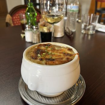 Mona’s French Cafe - French onion soup... got the cheese, onions and bread right but the broth had an odd taste. - French Near Me - Cypress, Texas