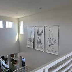 Spencer's Handyman Services - 3 tapestries over staircase and tall ceiling