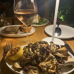 Hen of the Woods mushroom appetizer at The Blue Door. Perfectly prepared with grilled lemon. Hen of the Woods mushroom appetizer at The Blue Door. Perfectly prepared with grilled lemon.