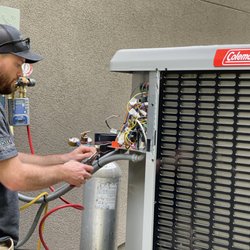 Vernon Air Conditioning, Plumbing & Electrical Services - Jim finishing an install of a 5-ton / 19 SEER central air heat pump.