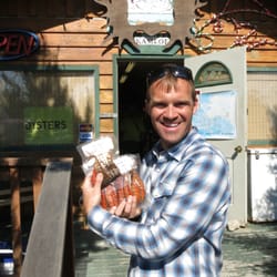 Tustumena Smokehouse - Me with smoke salmon on our way to Homer