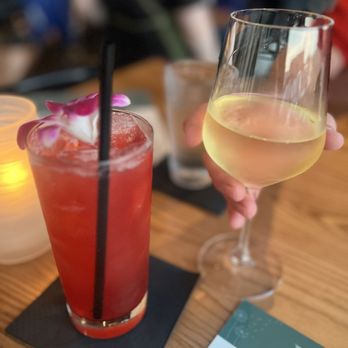 Roots Seasonal Cuisine - Sea sun Chardonnay and pomegranate lemon drop - New American Near Me - Lee's Summit, Missouri