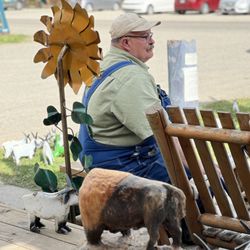 Silver Gate Lodging - Tom seated outside the store