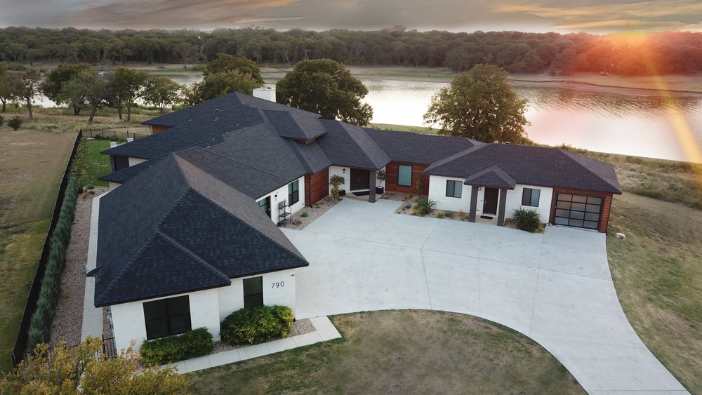 Slide of Compass Roofing