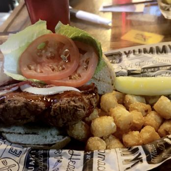 Steamworks Pub - Hot chicken sandwich with tater tots. - Pubs Near Me - New Port Richey, Florida
