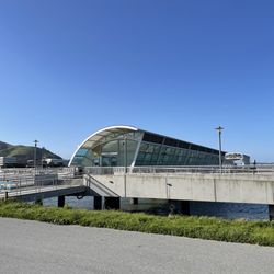 San Francisco Bay Ferry - South San Francisco - Long view of the dock and enclosed structure to board the ferry. The FERRY is behind this structure! I promise!