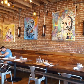 Centro Bar & Kitchen - The wall paintings scattered throughout - Tapas/Small Plates Near Me - Reno, Nevada