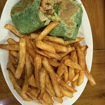 Portside Seafood And Grill - Blackened shrimp wrap and seasoned fries. - Seafood Near Me - Hammond, Louisiana Portside Seafood And Grill - Blackened shrimp wrap and seasoned fries. - Seafood Near Me - Hammond, Louisiana