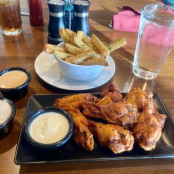 Zane’s original - Pit Smoked Wings 8 piece Parmesan Truffle Fries - Burgers Near Me - Seabrook, Texas