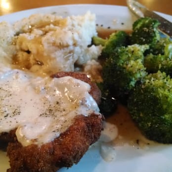 Red Rocks Grill - A moist breaded pork chop, mashed potatoes, and tender broccoli.  A down-home comfort-food dinner! - American Near Me - Morrison, Colorado