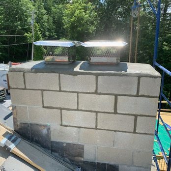 Leighton’s Landscapes And Masonry - a view of a chimney - Masonry/Concrete Near Me