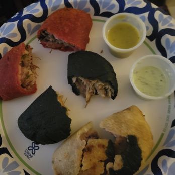 Nadas - inside all the empanadas with grilled tomatillo sauce and cilantro lime crema - Empanadas Near Me - Harrison, New York