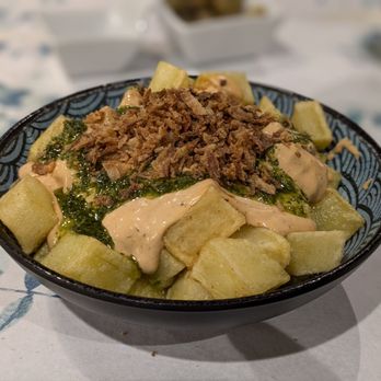 Bendito - chunky potatoes with sauce - Sushi Bars Near Me - Málaga, Massachusetts