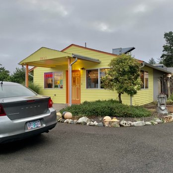 Depoe Baykery - a car parked in front of a yellow house - Bakeries Near Me - Gleneden Beach, Oregon Depoe Baykery - a car parked in front of a yellow house - Bakeries Near Me - Gleneden Beach, Oregon