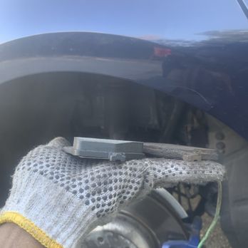 Jay’s Mobile Brake Shop - The used pads show significant wear, indicated by the worn-down friction material, suggesting they are due for replacement. - Auto Repair Near Me Jay’s Mobile Brake Shop - The used pads show significant wear, indicated by the worn-down friction material, suggesting they are due for replacement. - Auto Repair Near Me