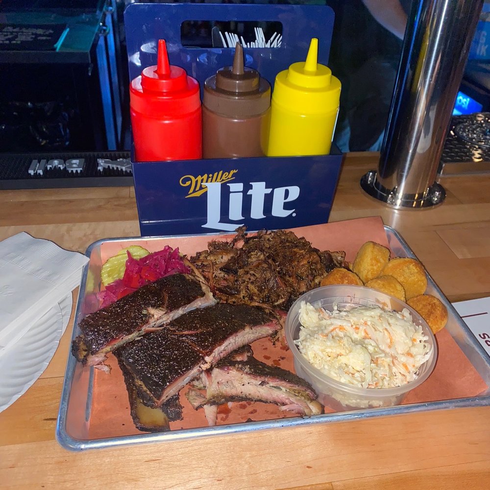 Ribs, pulled pork, cole slaw, corn bread
