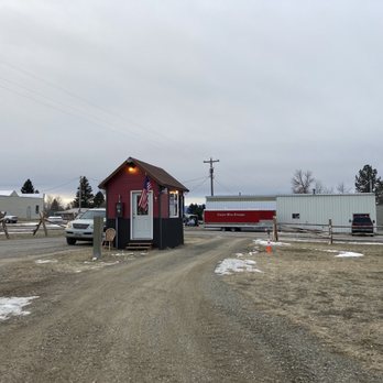 Joyous Java - a small red building with a red door - Coffee & Tea Near Me - Clyde Park, Montana
