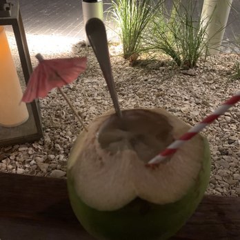 Amara at Paraiso - A coconut drink I don't remember the name but I asked for a spoon and was able to scrape the coconut inside Of course I am Cuban!!!! - Latin American Near Me - Miami, Florida Amara at Paraiso - A coconut drink I don't remember the name but I asked for a spoon and was able to scrape the coconut inside Of course I am Cuban!!!! - Latin American Near Me - Miami, Florida