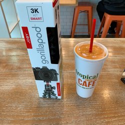 Tropical Smoothie Cafe - Time to enjoy my Oranger Ginger Glow and set up my new tripod!!