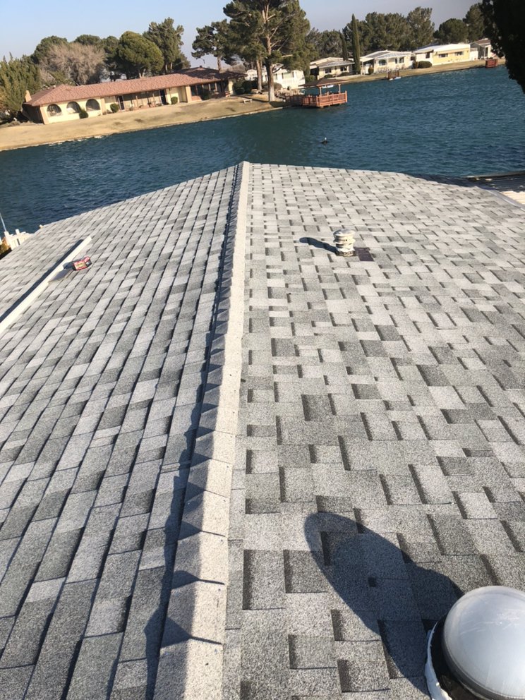 Slide of The Roof Repair Guy