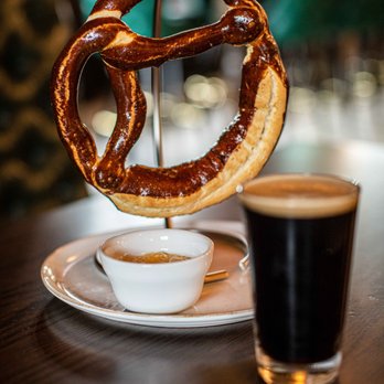 Mickey's Irish Pub - Large pretzel served with beer cheese, perfect snack while watching the World Cup - Irish Pub Near Me - Fullerton, California Mickey's Irish Pub - Large pretzel served with beer cheese, perfect snack while watching the World Cup - Irish Pub Near Me - Fullerton, California