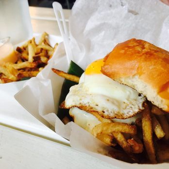 Frita Batidos - Beef Frita with bacon, egg, and cheese. Side of fries too, of course! - Cuban Near Me - Ann Arbor, Michigan