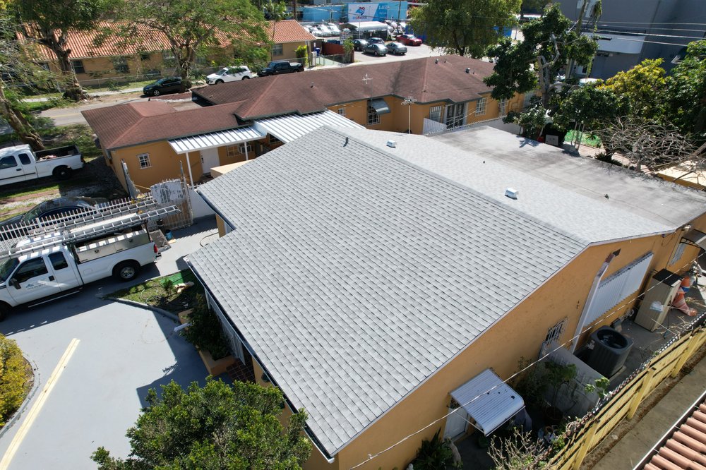 Slide of Nacs Roofing