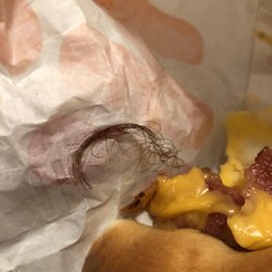Dunkin' - Huge piece of hair in my breakfast sandwich!
