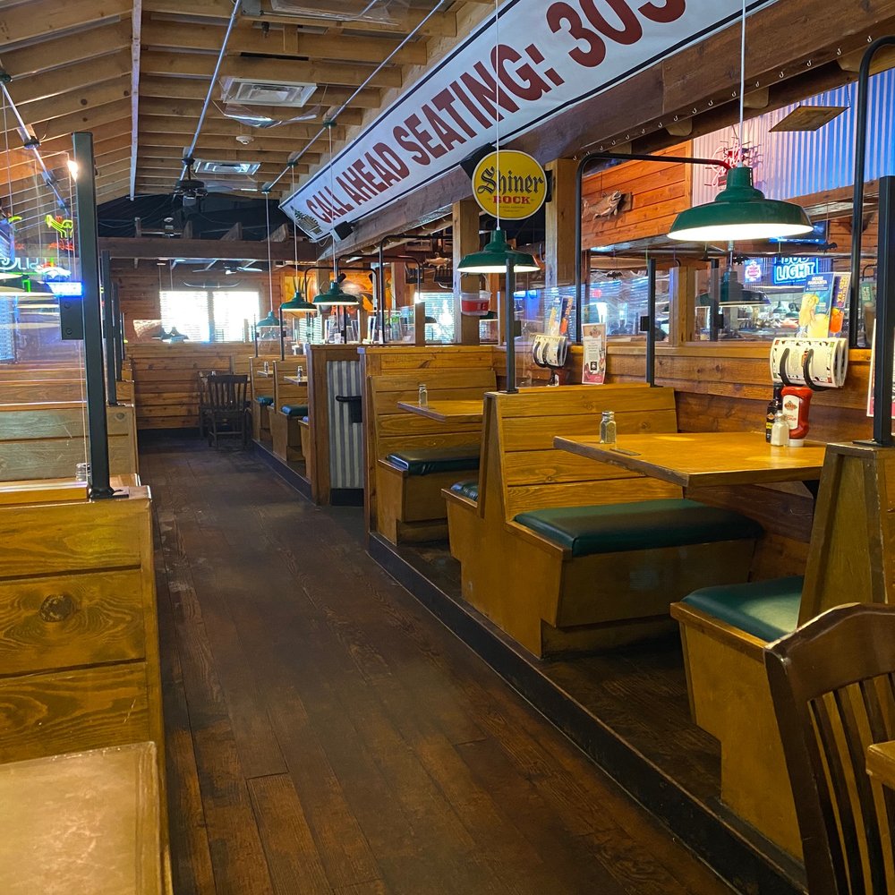 Texas Roadhouse - The rustic decor is wooden walls and seating. - Steakhouses Near Me - Littleton, Colorado Texas Roadhouse - The rustic decor is wooden walls and seating. - Steakhouses Near Me - Littleton, Colorado