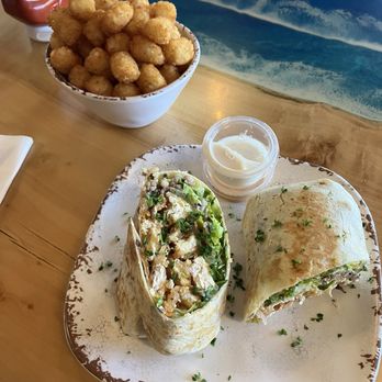 The Mustard Seed - Blackened Cajun Fish Wrap and Tater tots - Vegan Near Me - Cerritos, California The Mustard Seed - Blackened Cajun Fish Wrap and Tater tots - Vegan Near Me - Cerritos, California