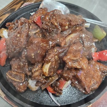 2 China Fun - Sizzling beef on hot skillet - Chinese Near Me - Queens, New York