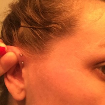 Ice 9 Studio - This is me pulling the earring through my swollen ear - Tattoo Near Me - Pittsburgh, Pennsylvania