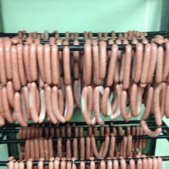 Meelan's Market - a rack of hot dogs - Meat Shops Near Me - Clark Mills, New York Meelan's Market - a rack of hot dogs - Meat Shops Near Me - Clark Mills, New York