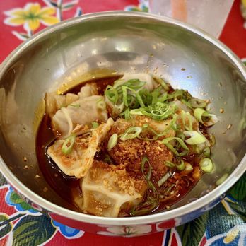 Lucky Tigre - Spicy Chili Oil Dumplings (Vegan) ($10 - Impossible Foods "Pork" and veggie mix in chili oil and garlic sesame dumpling sauce - Food Trucks Near Me - Tampa, Florida Lucky Tigre - Spicy Chili Oil Dumplings (Vegan) ($10 - Impossible Foods "Pork" and veggie mix in chili oil and garlic sesame dumpling sauce - Food Trucks Near Me - Tampa, Florida