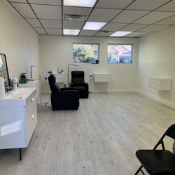 Official Pro Smiles - Inside Official Pro Smiles location for teeth whitening and tooth gems.