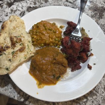 Swagat Indian Restaurant - Muttar paneer, chicken 65, lamb curry, and garlic naan - Indian Near Me - Dubuque, Iowa Swagat Indian Restaurant - Muttar paneer, chicken 65, lamb curry, and garlic naan - Indian Near Me - Dubuque, Iowa