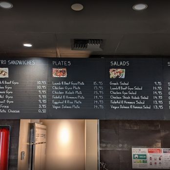 Gyros Place - a menu on the wall - Greek Near Me - Seattle, Washington Gyros Place - a menu on the wall - Greek Near Me - Seattle, Washington