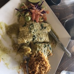 Dry rice . Old lettuce and flavorless enchiladas Dry rice . Old lettuce and flavorless enchiladas