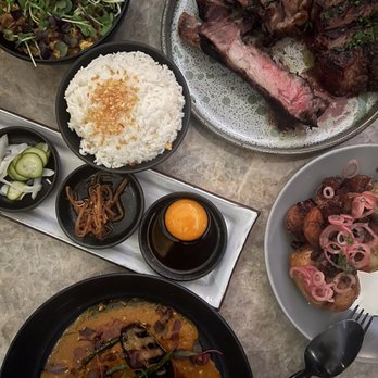 Animae - Top left: wagyu fried rice; Top right: dry aged rib eye; Bottom left: short rib kare kare; Middle right: crispy potatoes - Asian Fusion Near Me - San Diego, California Animae - Top left: wagyu fried rice; Top right: dry aged rib eye; Bottom left: short rib kare kare; Middle right: crispy potatoes - Asian Fusion Near Me - San Diego, California