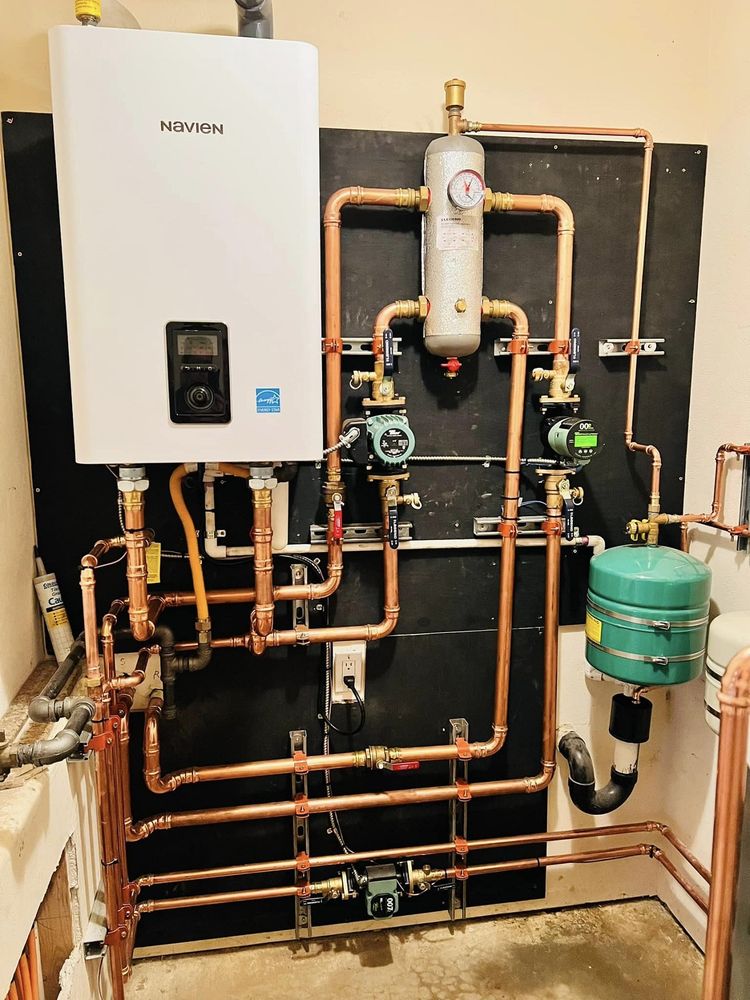 Slide of Wolff Heating Cooling and Plumbing