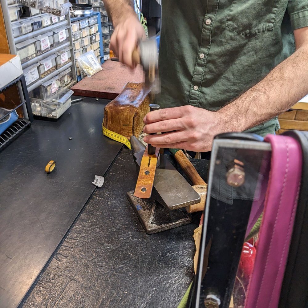 Moonshine Leather - Jacob hammering on my custom belt. - Leather Goods Near Me - Nashville, Indiana Moonshine Leather - Jacob hammering on my custom belt. - Leather Goods Near Me - Nashville, Indiana